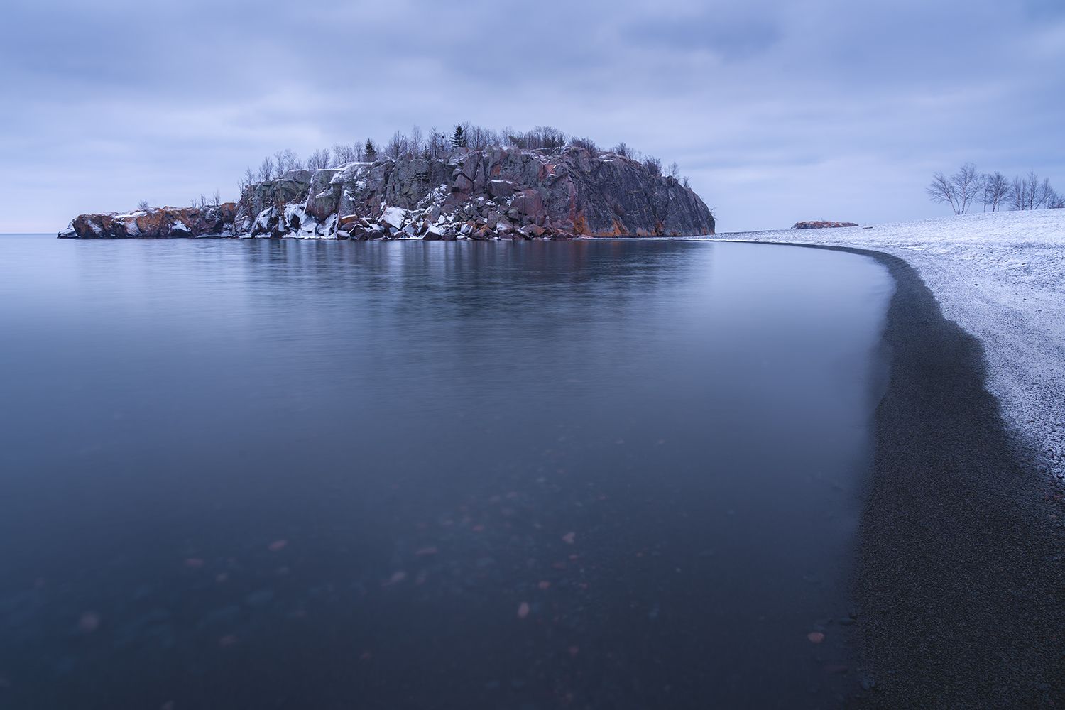 Black Beach on Lake Superior on a dark winter morning