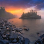 A foggy island at sunrise off the coast of Lake Superior